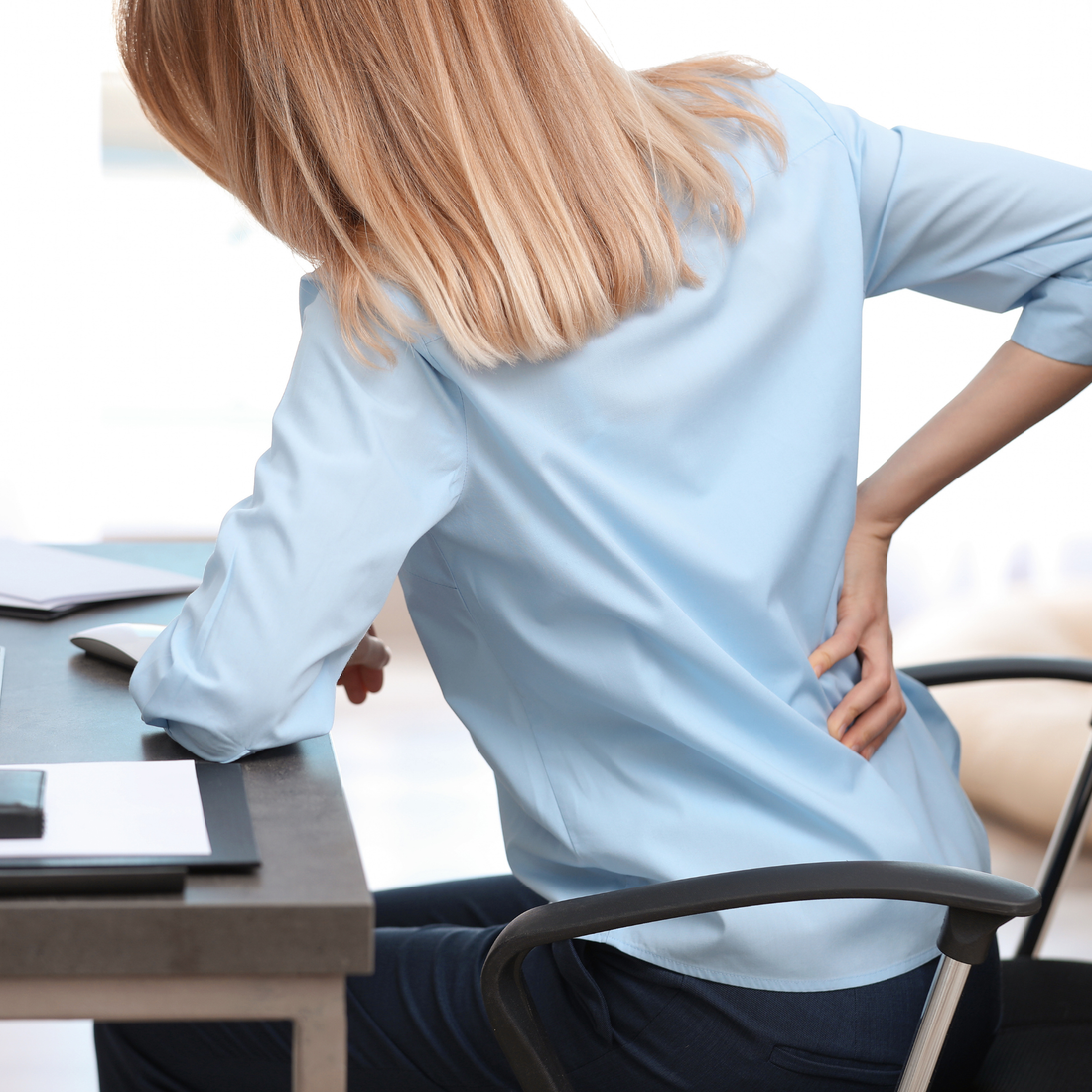 How Moxibustion Eases Office Workers' Nagging Lower Back Stiffness